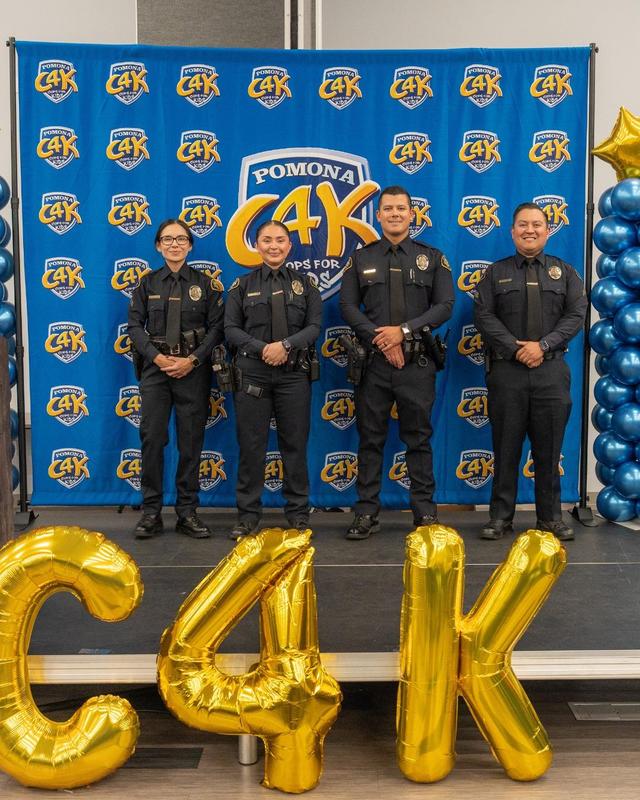 CK officers 4 pose in booth