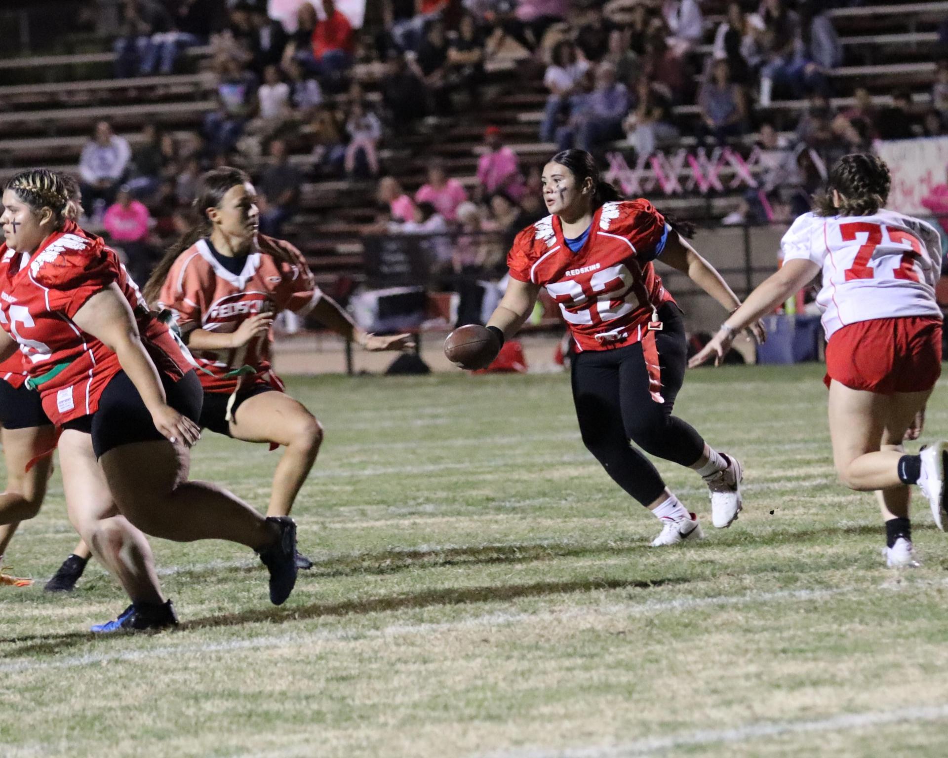 girls playing flag football
