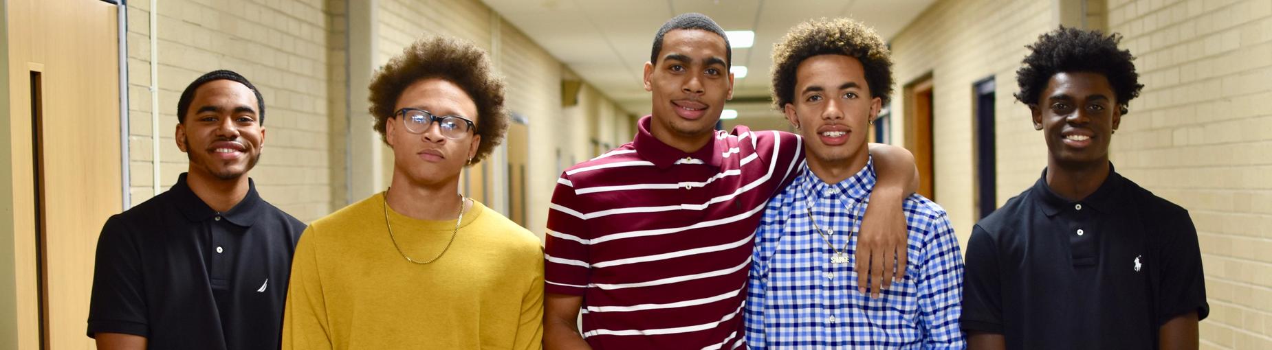 five students in hallway