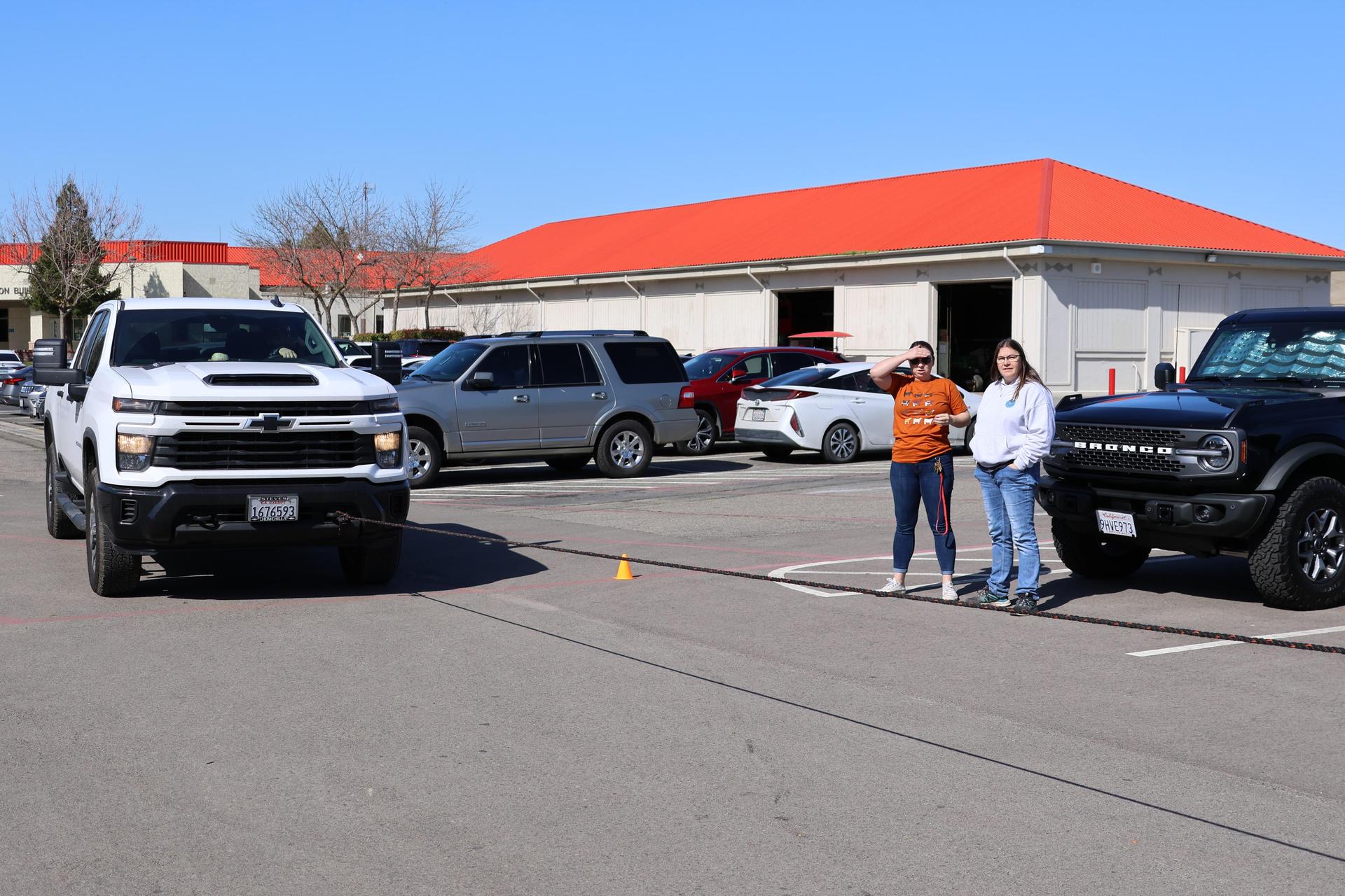 students and staff enjoying the truck pull