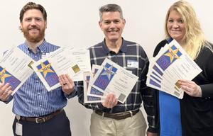Members of the TISD Communications Department pose with their Star Awards