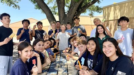 Students enjoying popsicles