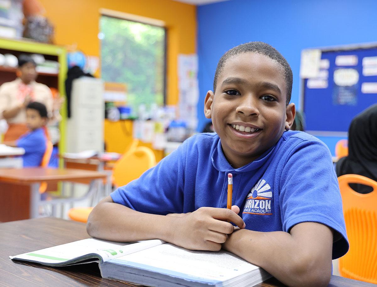HSA Cincinnati student playing piano in the classroom