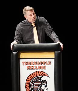 Assistant High School Principal Jeff Dock speaks to new inductees.