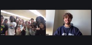 Group of students talking with Levi Wood on Video
