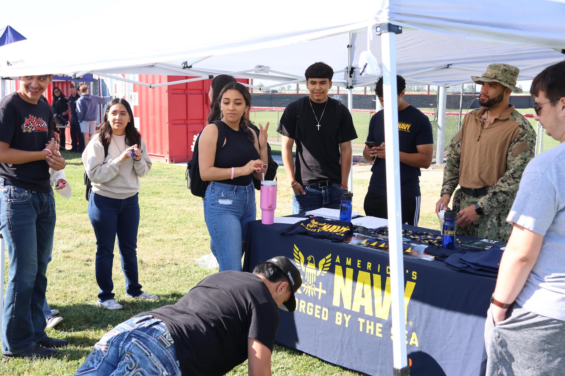 Navy recruiters speaking to students
