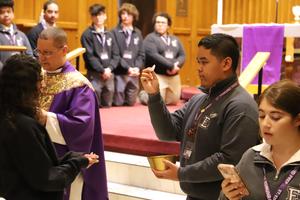 Victorian distributes Holy Communion for the first time.