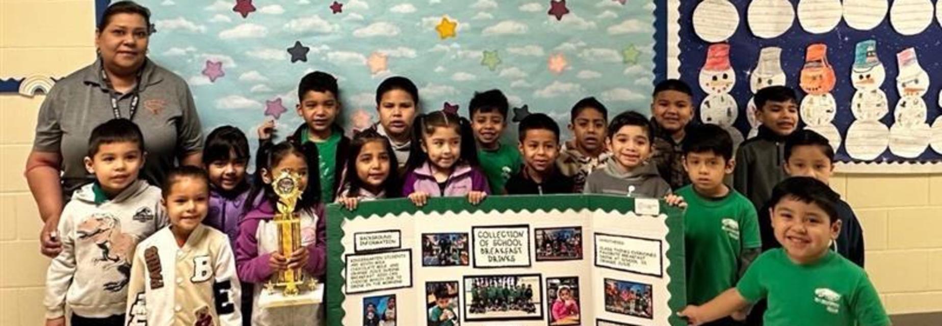 kinder with science fair prize