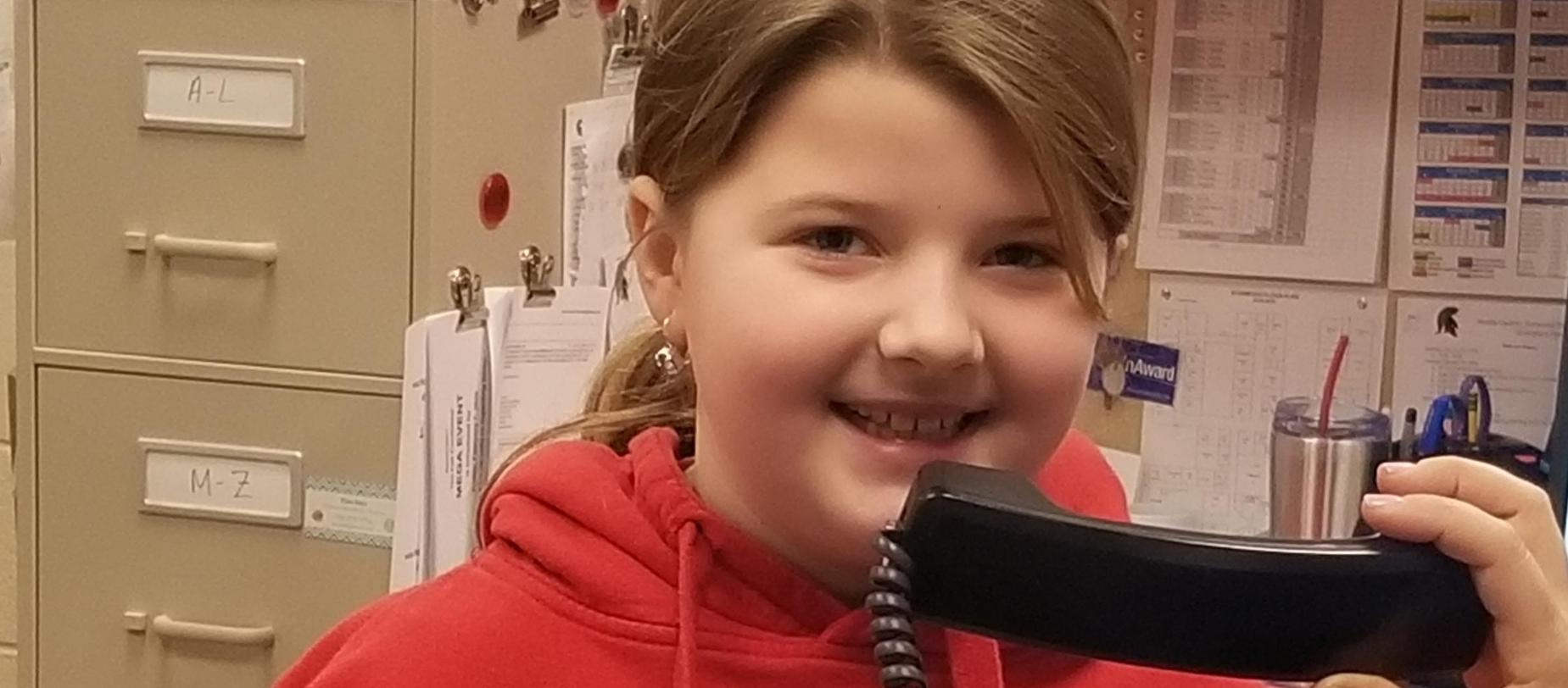 Student doing morning announcements