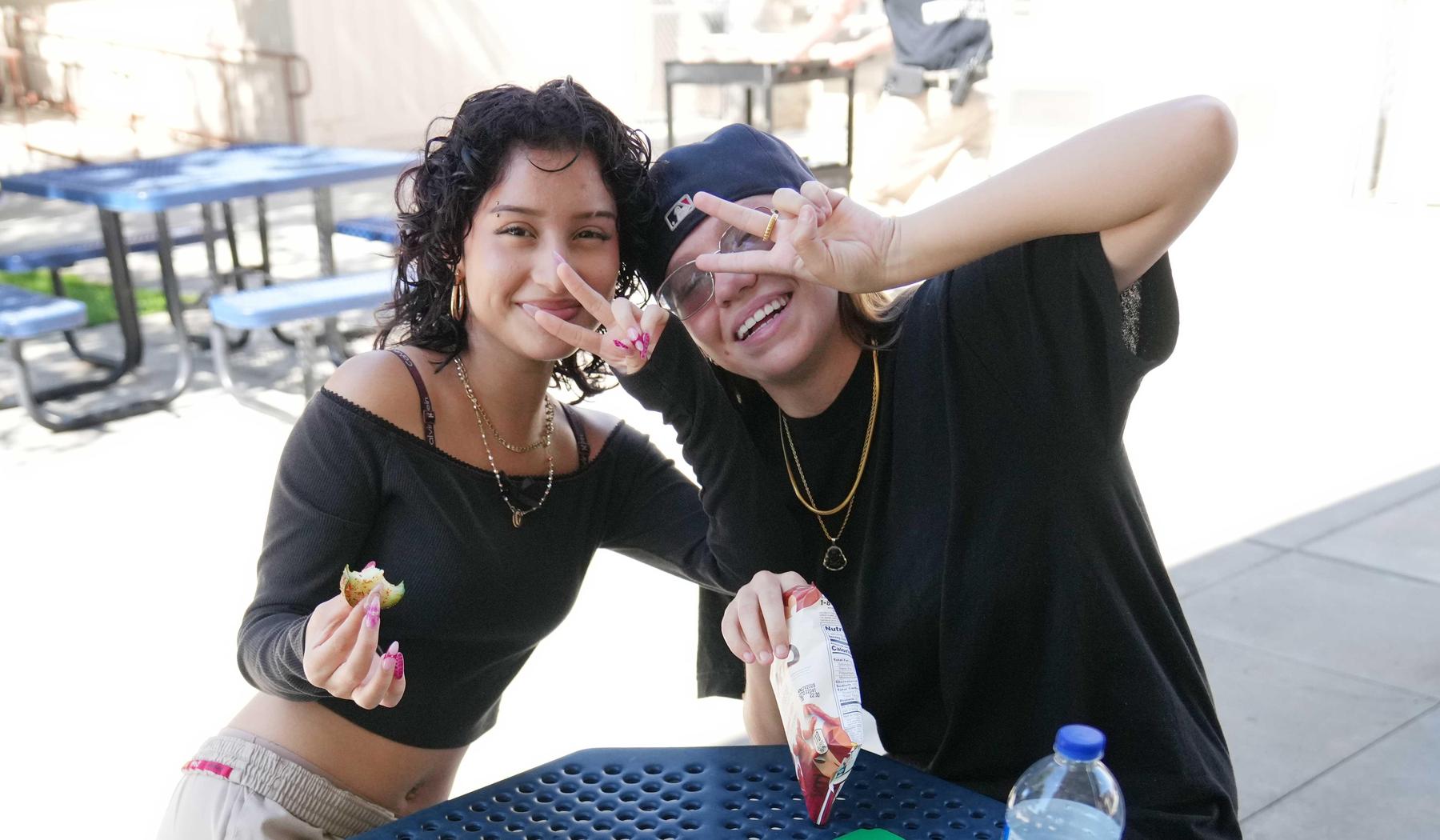 two smiling high school girls
