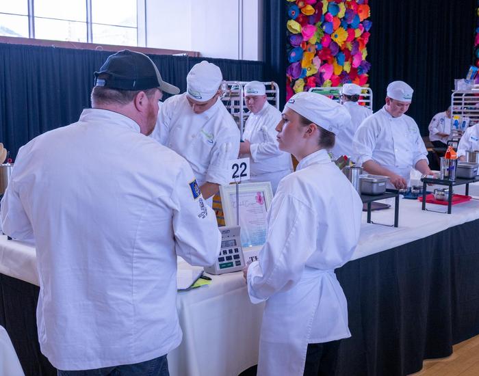 Students participating in cooking competition
