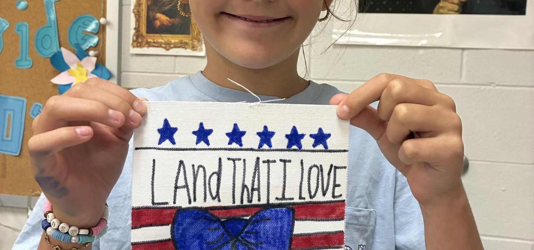Student with patriotic artwork