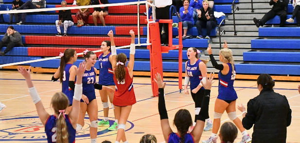 Girls playing volleyball