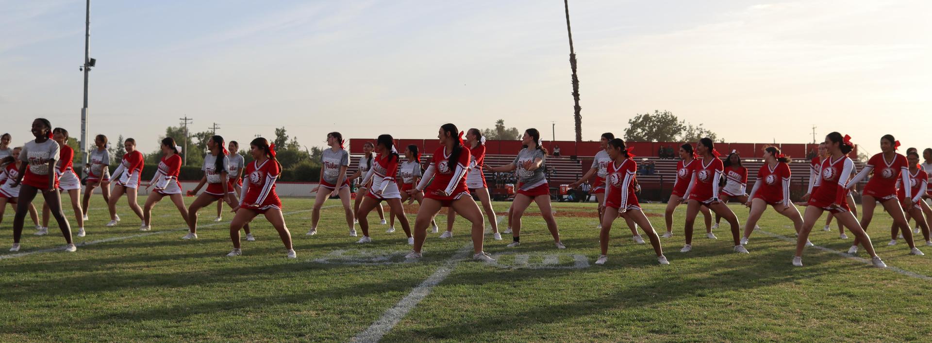 Cheerleaders performing at the football game
