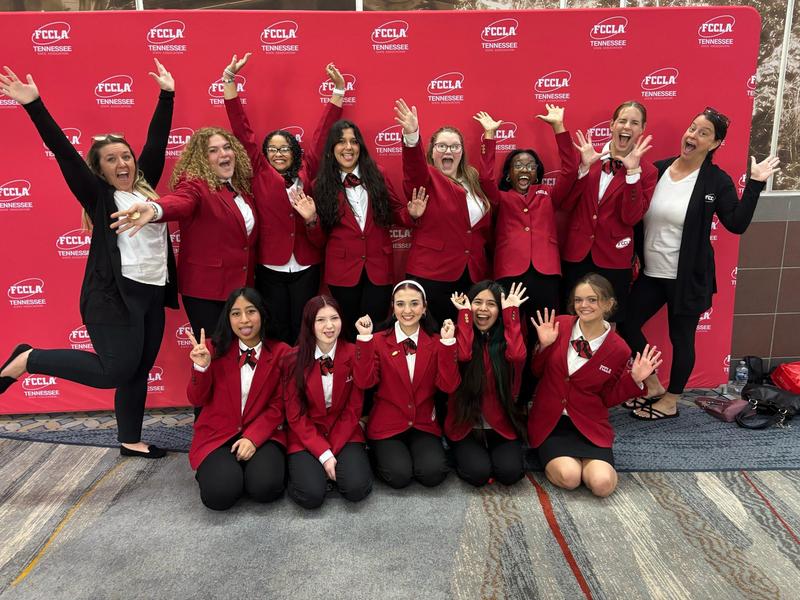 Students in business attire celebration photo