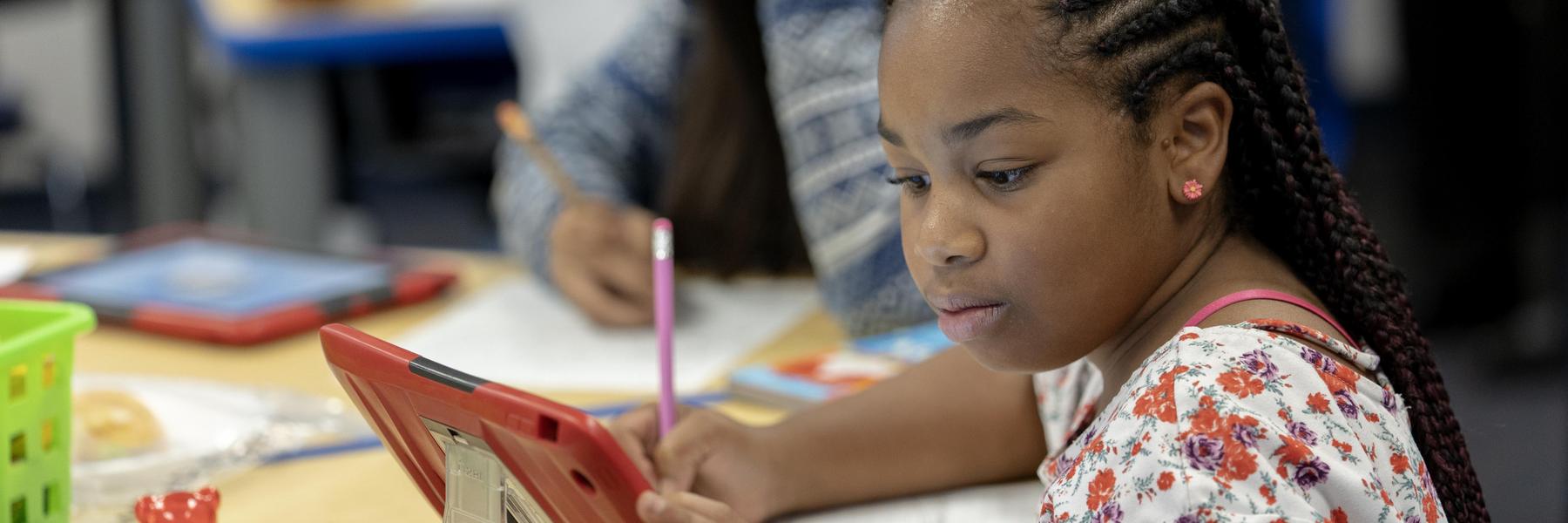 Student on iPad