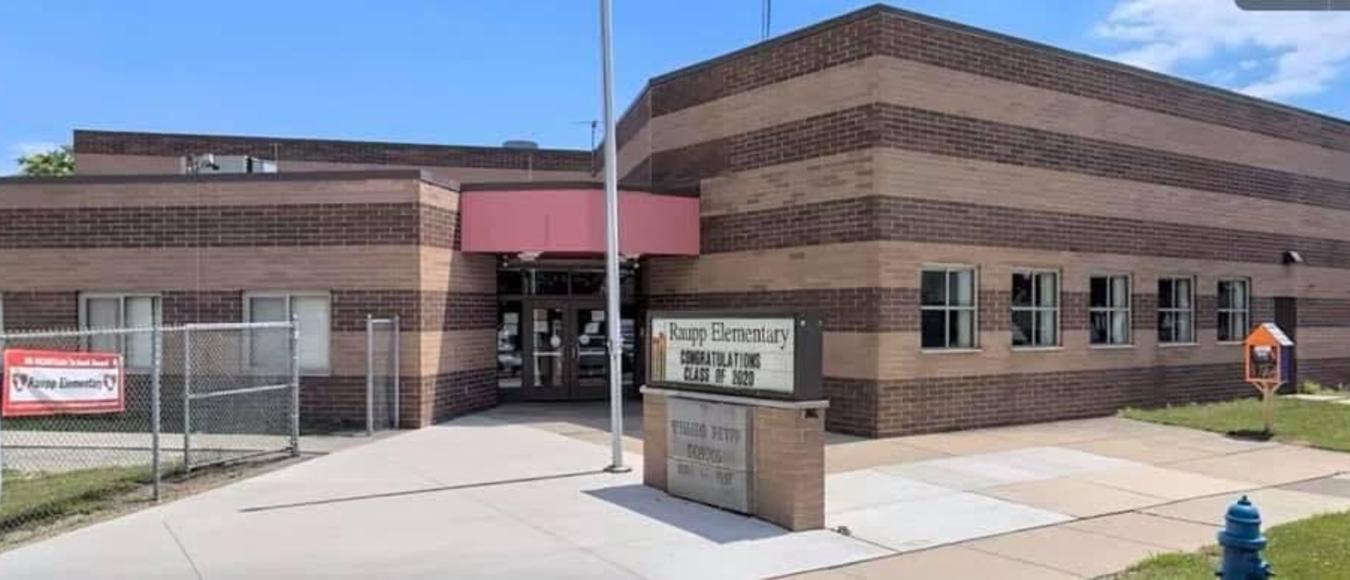 Brick exterior of Raupp Elementary School building.