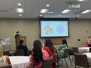 Adriel Coh giving presentation