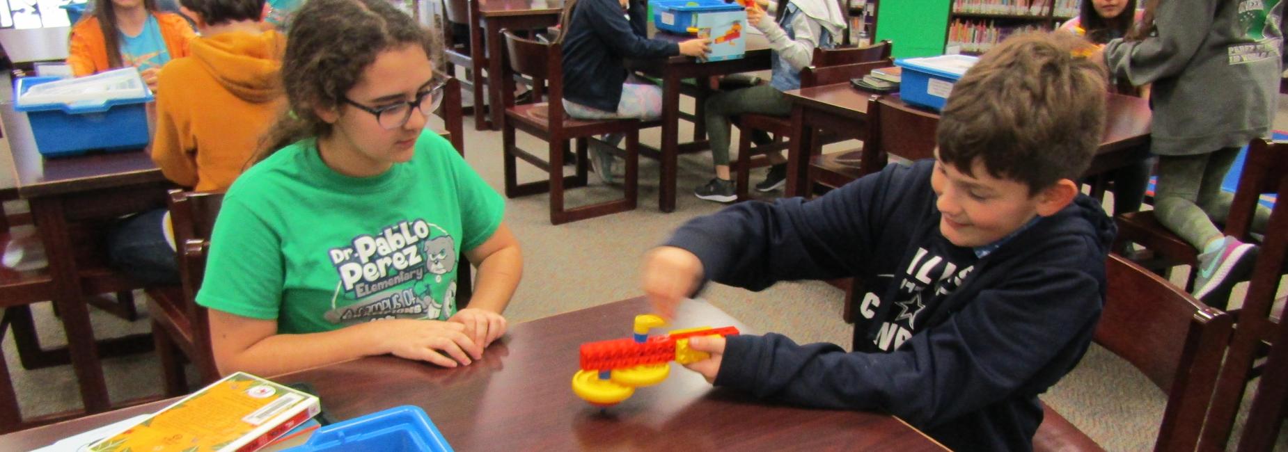 students working with gears.