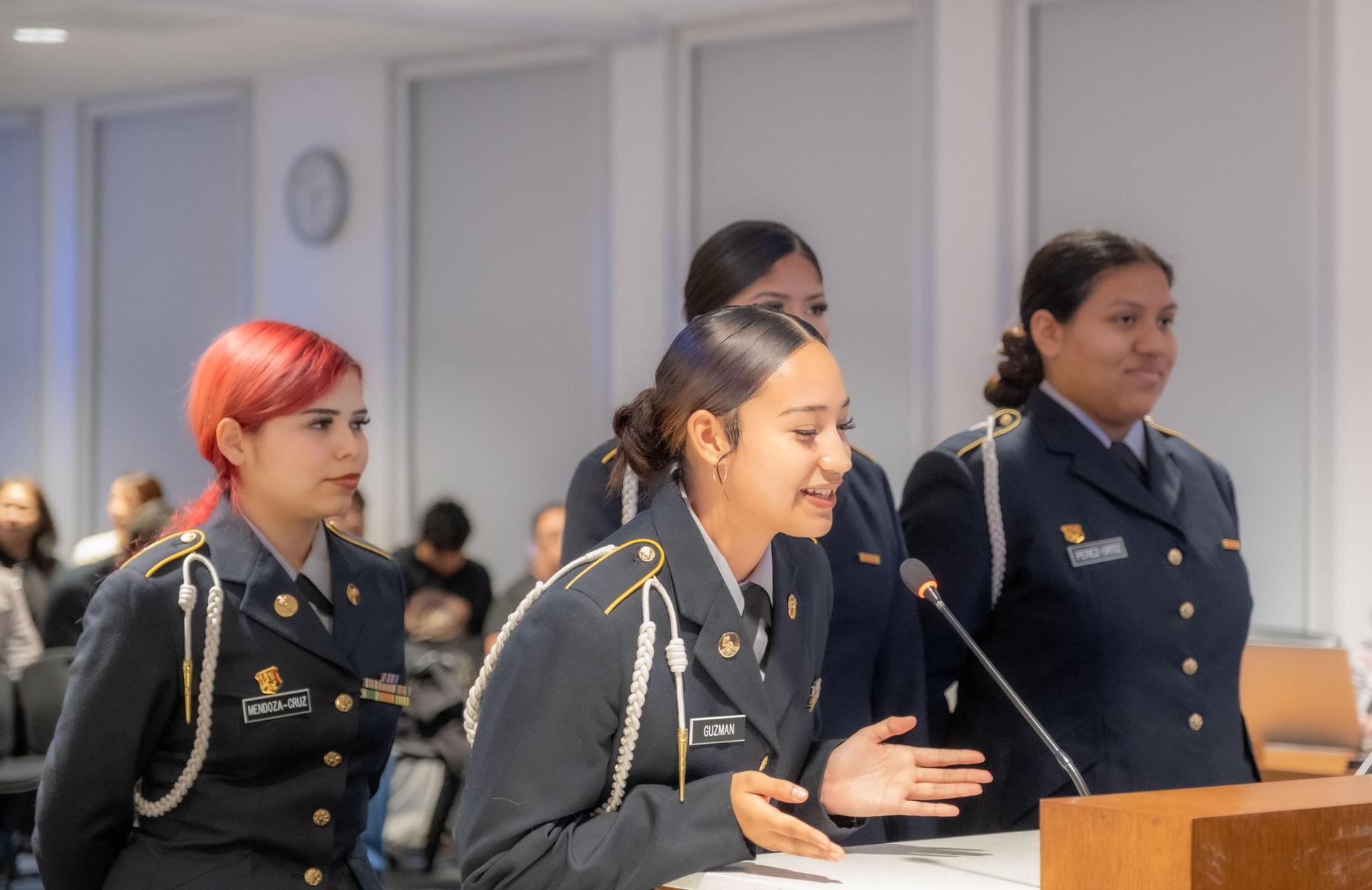 4 persons in school board room