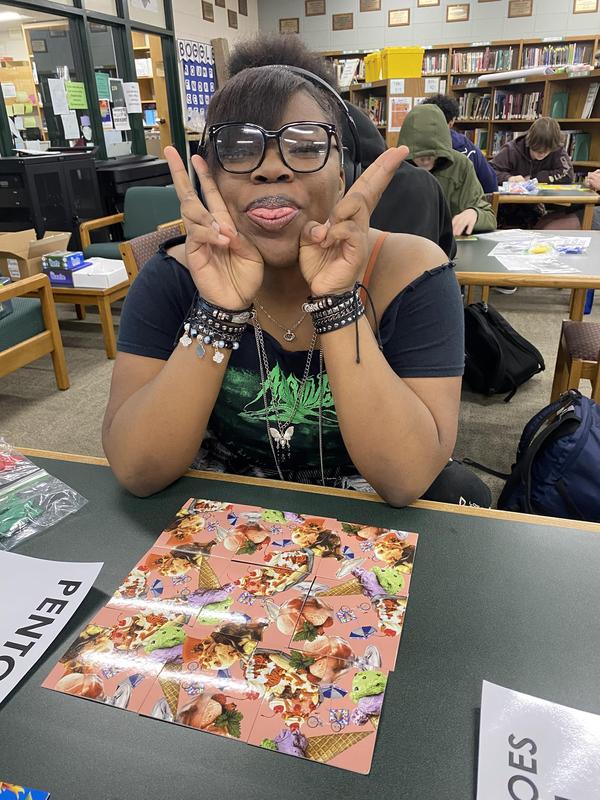 student doing a puzzle