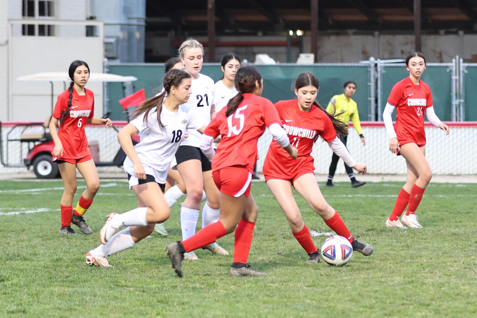 Junior varsity girls playing soccer against liberty