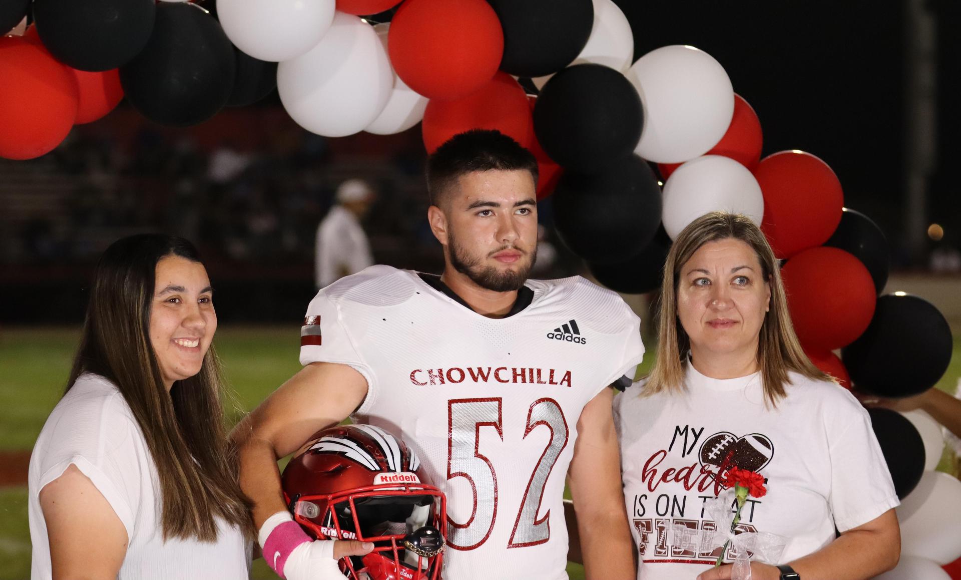 seniors and their escorts celebrating senior night
