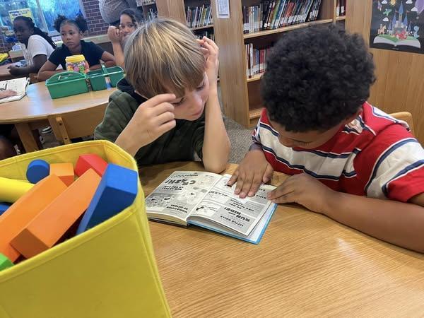 We love when we see students engaged in reading! Not only in the library but also in the cafeteria!!