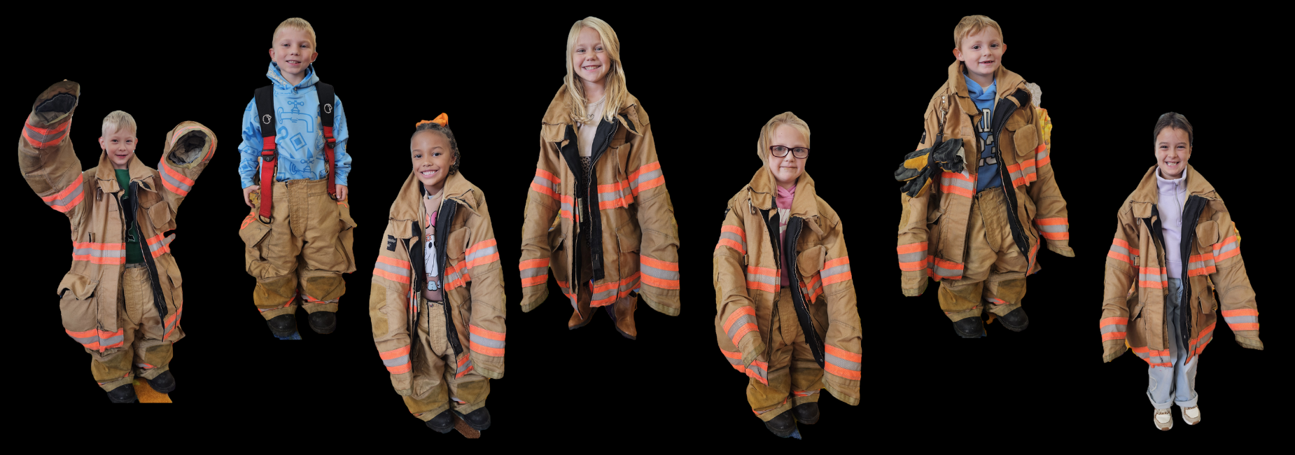 Children in oversized firefighter jackets posing for a group photo.