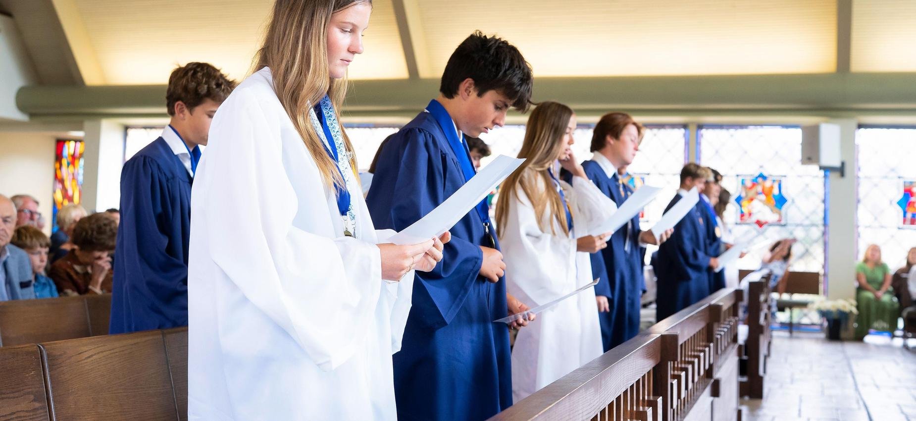 8th grade gradautes recite prayer at close of graduation
