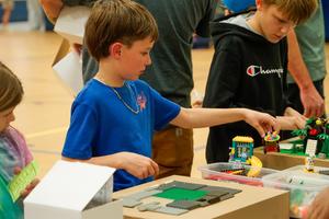 Students playing with Legos at Legacy Family Steam Night