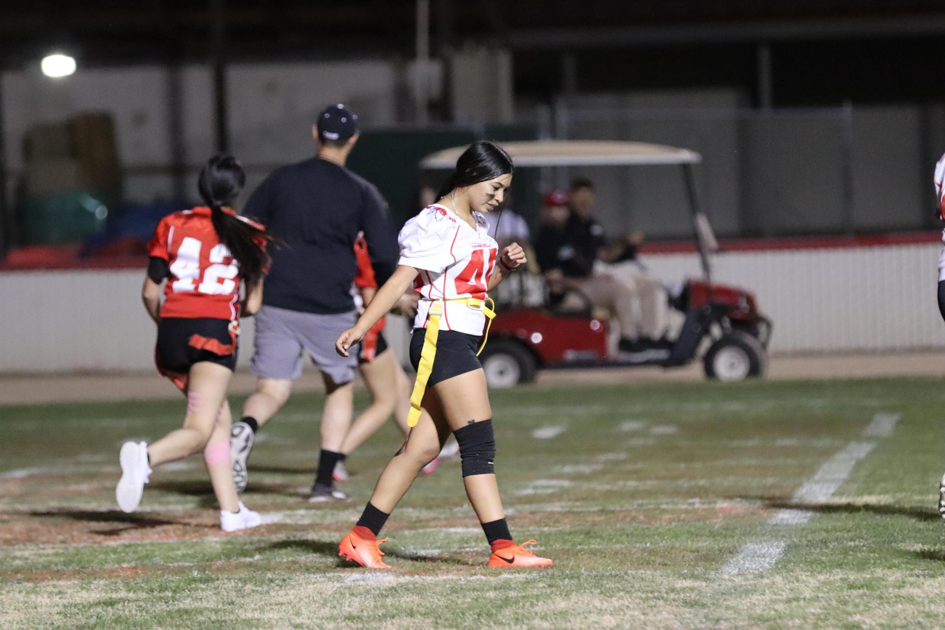 girls playing flag football