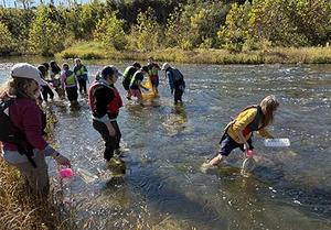 JRDS 7th graders gathering water samples during a recent field trip