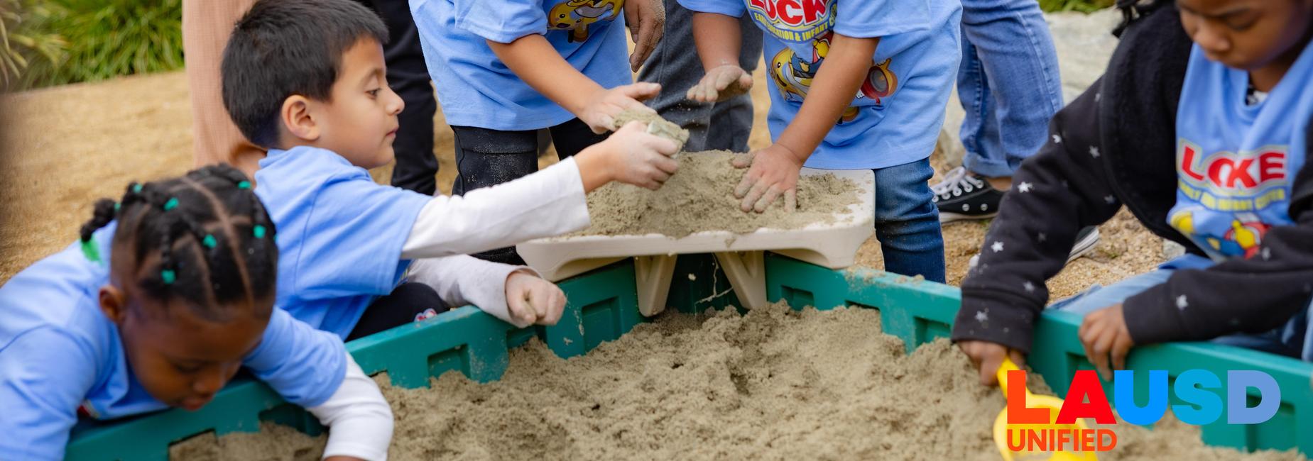 children playing in the sandbox