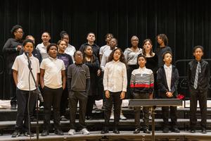 the 7th grade choir performs