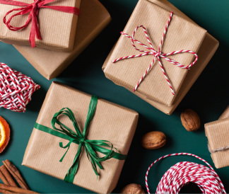 kraft paper wrapped gifts with green and red ribbons
