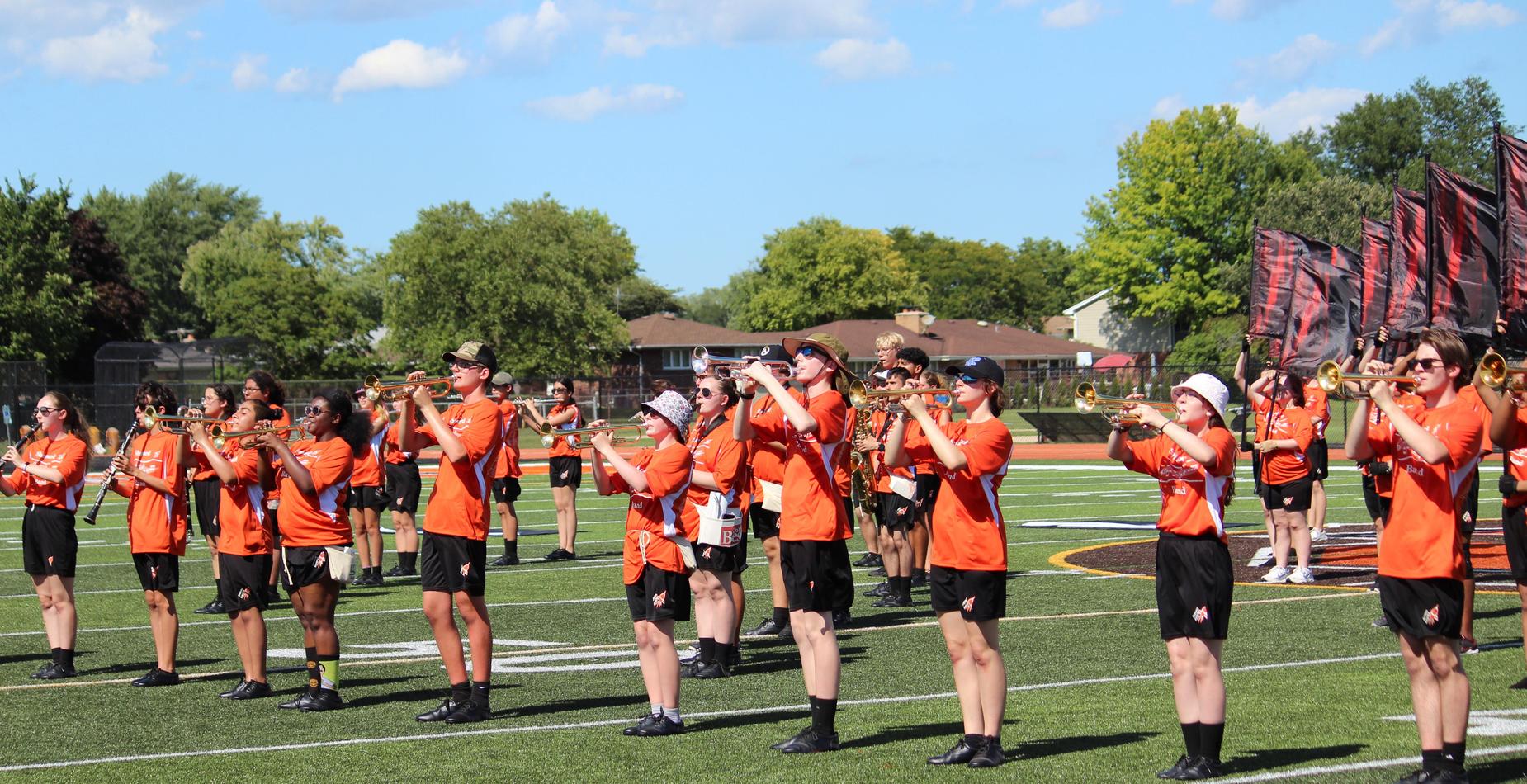The Shepard marching band worked long hours this summer refining their new field show!