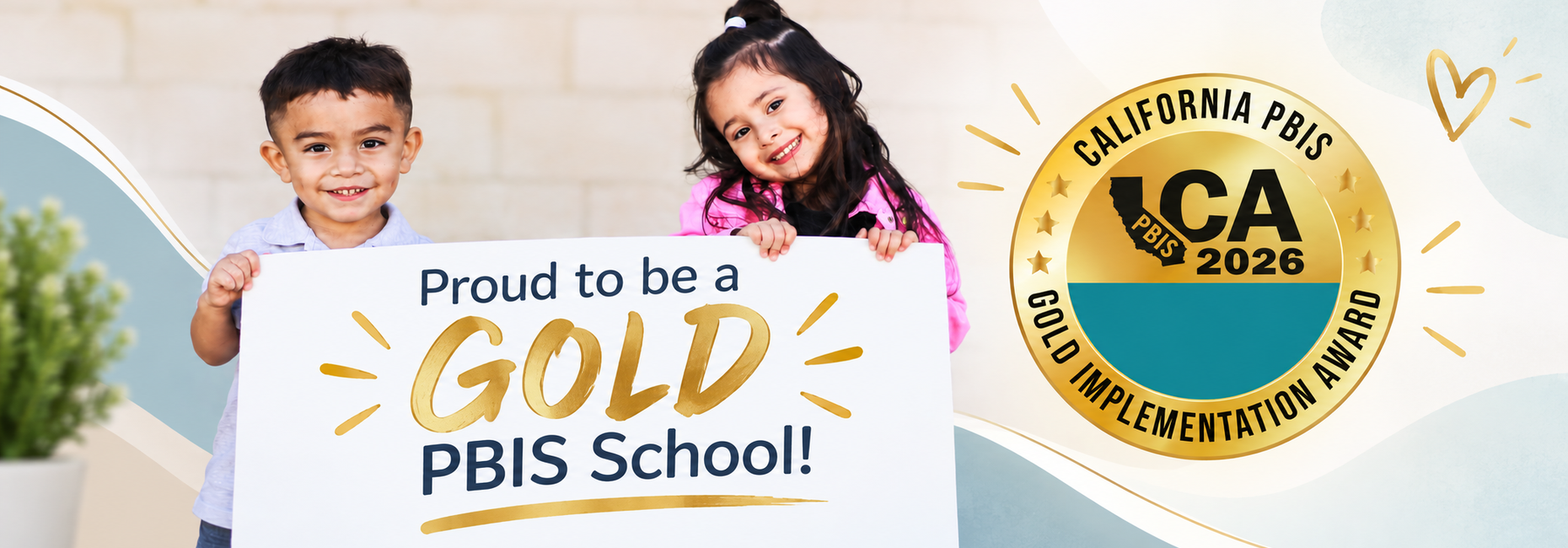 Two Santa Fe Elementary students celebrating the school&rsquo;s 2026 California PBIS Gold Implementation Award.