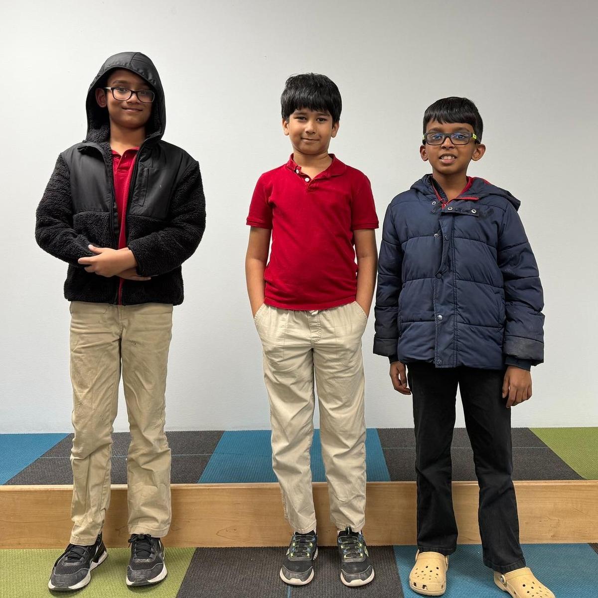 Students stand on the library risers