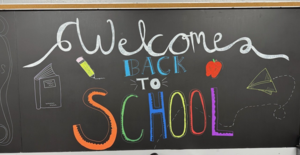 Welcome sign on a chalkboard.