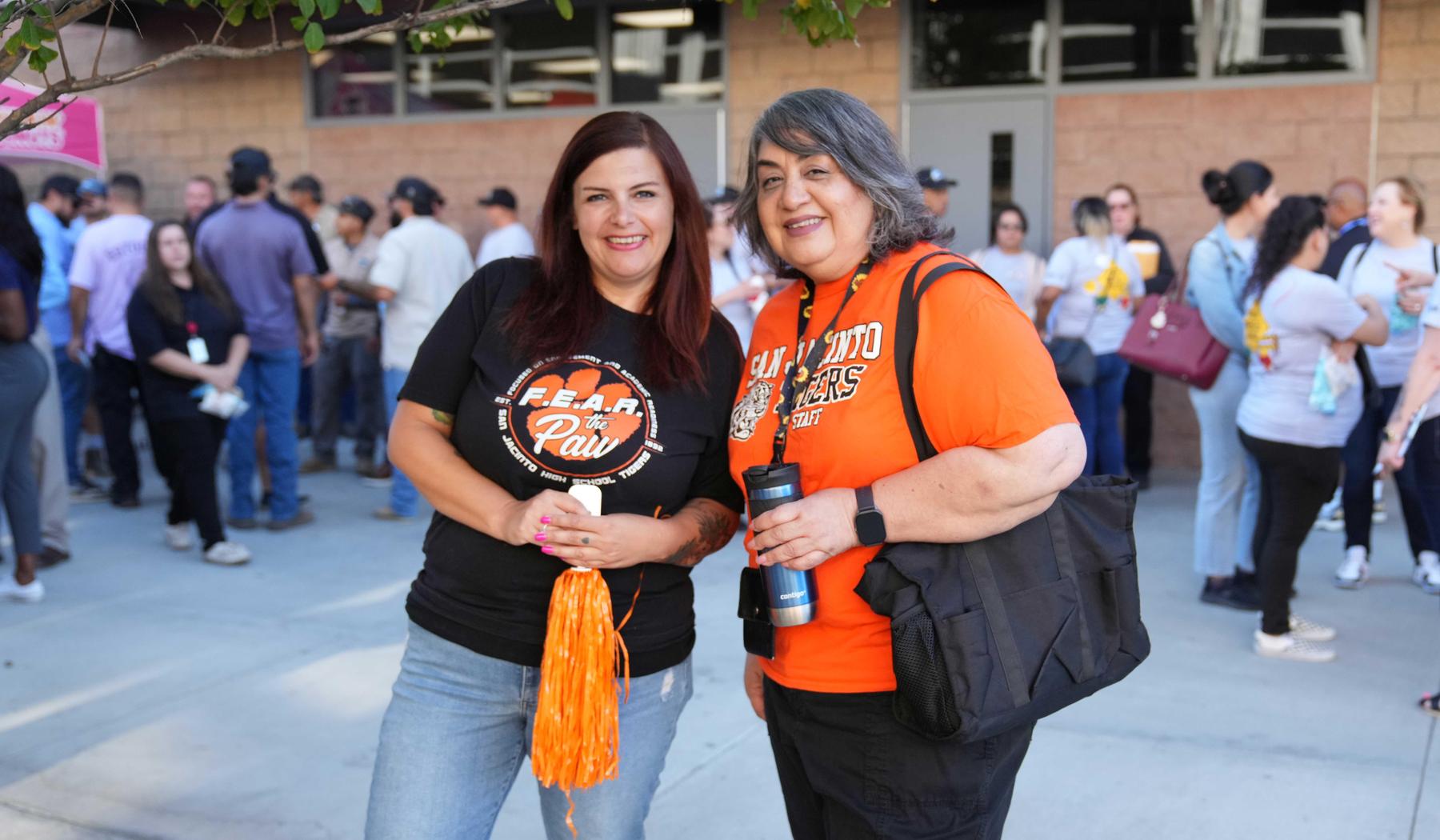 two ladies with SJHS t-shirts