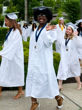 graduate waving