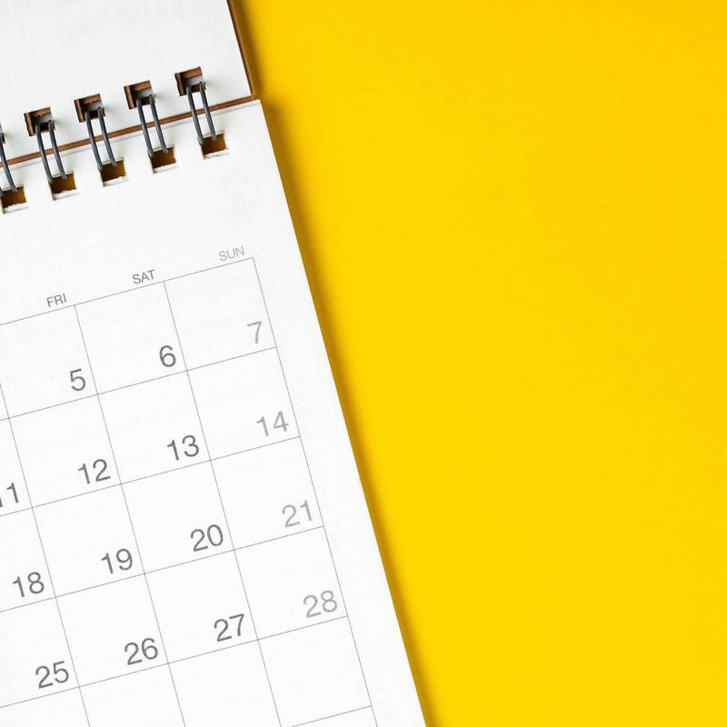 Calendar page against a yellow background