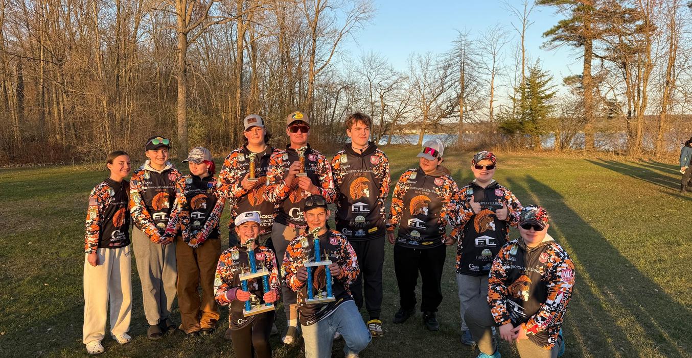 Members of the TKMS bass fishing club pose for a photo after a tournament.