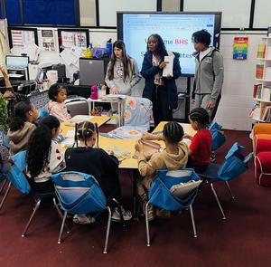 BHS Student sitting with Davis students