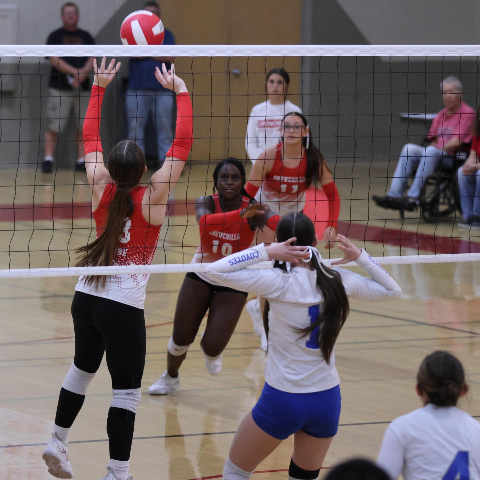 Varsity girls Volleyball playing vs. Madera 53