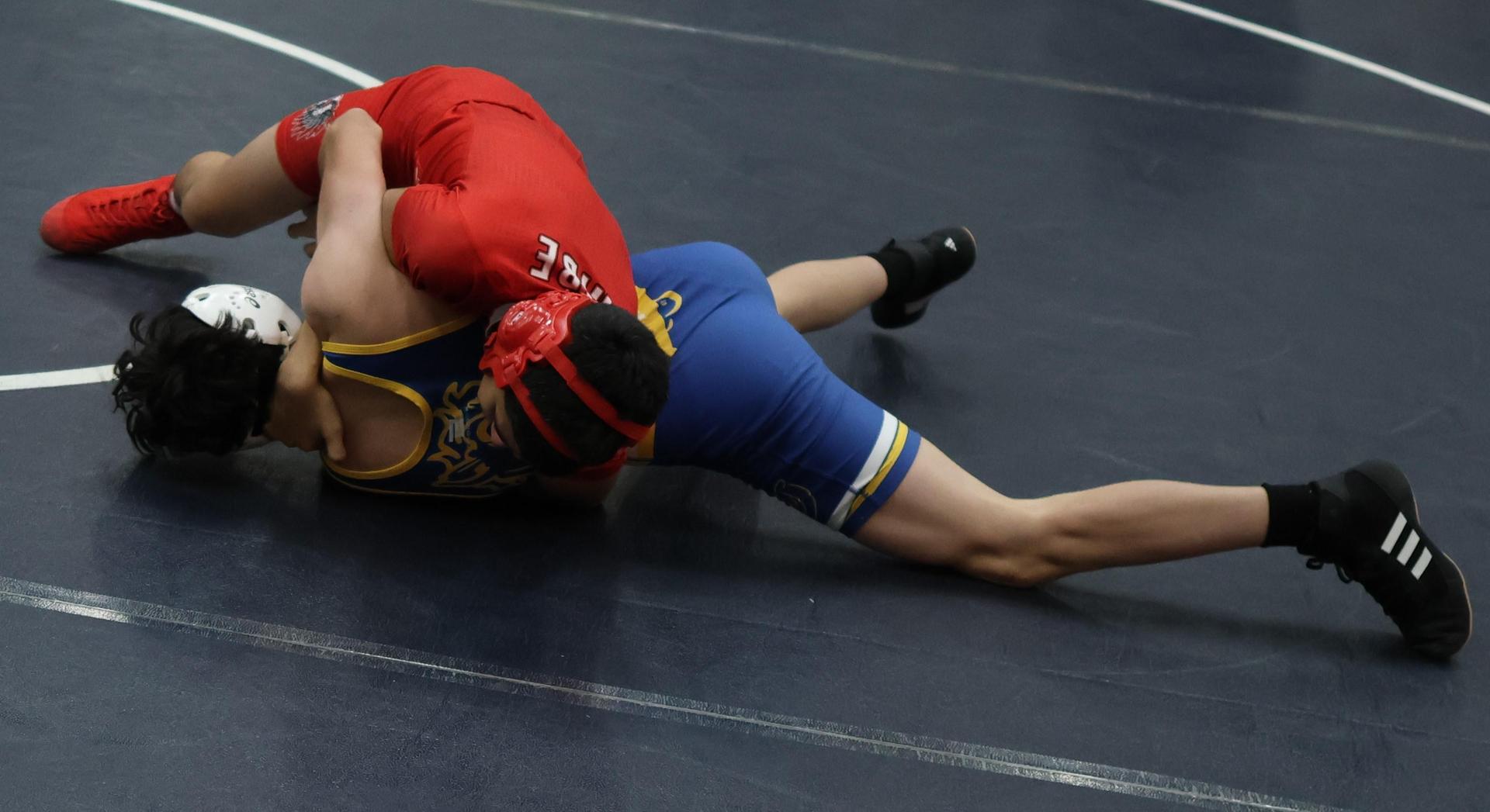 Boys wrestling in the Liberty Duals event 63