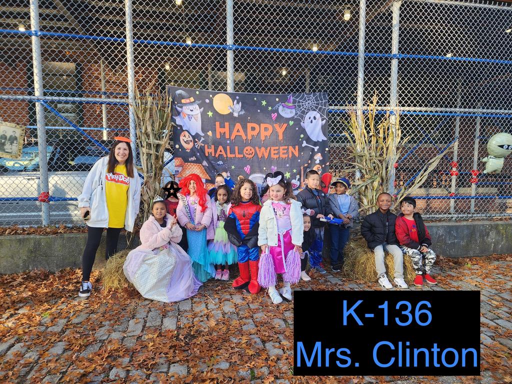 staff and students in halloween costumes