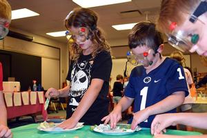 young students conducting science experiments