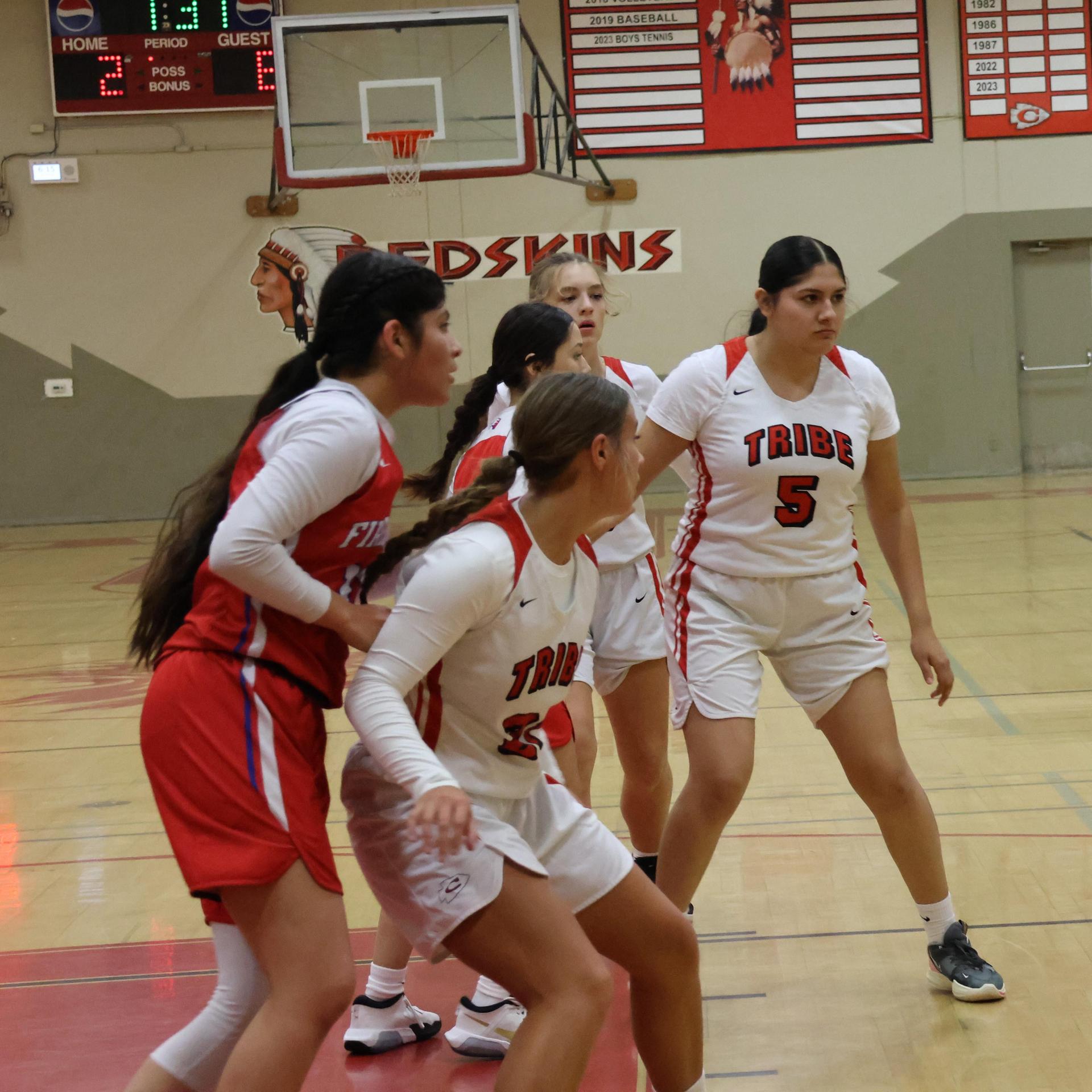Varsity Girls Basketball playing against Firebaugh